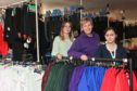 Left to right: Moray School Bank’s Racheal Glennie Debbie Kelly and Mhairi Ward making up a uniform pack to go to a school pupil.