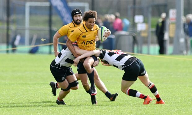 Gordonians captain 
Daniel Osugo on the attack. Picture by Kenny Elrick.