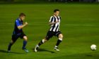 Fraserburgh's Ryan Cowie, right, looks to get away from Huntly's Alexander Jack