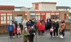 The Save Meethill School Group gather outside the Peterhead primary earlier this year