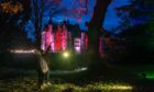 Pictures by JASON HEDGES    
04.11.2020 URN: CRO24851
Brodie Castle is lit up with a light show on the castle and grounds to generate extra income over Winter and through the covid period.
Picture: Steven George and Leanne Murphy from Elgin are pictured
Pictures by JASON HEDGES