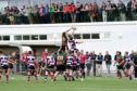 A lineout early in the match in front of the clubhouse.