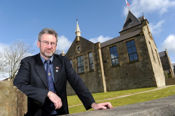 Steven Heddle, former Convener of Orkney Islands Council outside the council's headquarters in Kirkwall, Orkney in 2016.