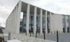 The bouncer admitted he overreacted and assaulted the man at Inverness Sheriff Court
