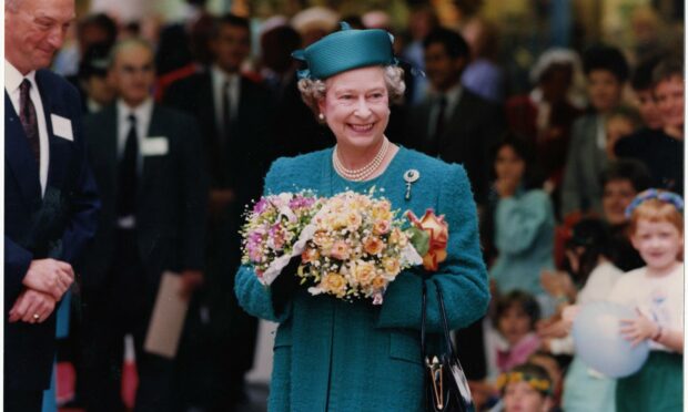 What was the Queen so fascinated by during her visit to the Bon Accord centre in 1990? (Photo: AJL)