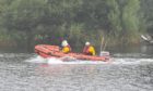 Lifeboat crews involved in search along the River Dee. Picture by Scott Baxter