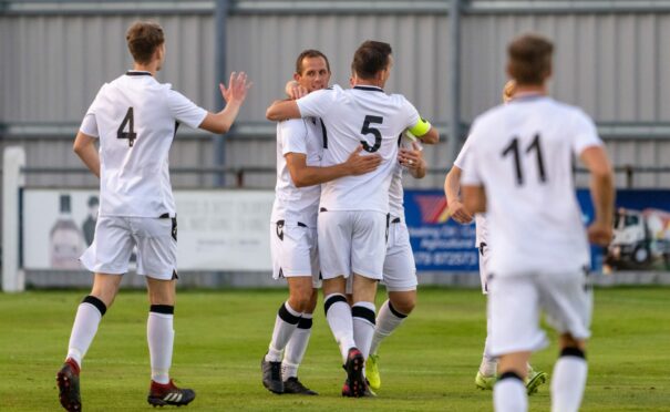 Celebrations for Rothes after Michael Finnis opens the scoring.