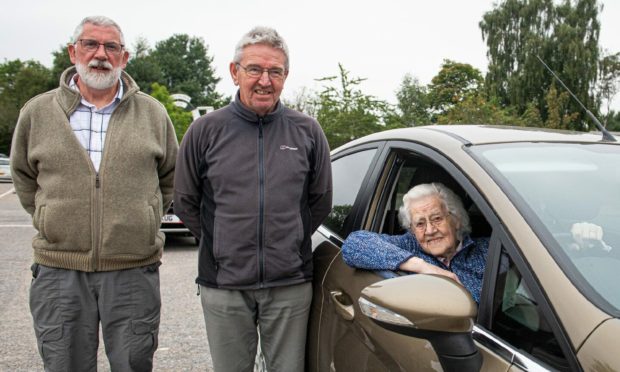 Left to right: Paul Stallard, Colin Spence and Gladys Cruickshank, volunteers with the Alford Car Transport Service.

Picture by Wullie Marr