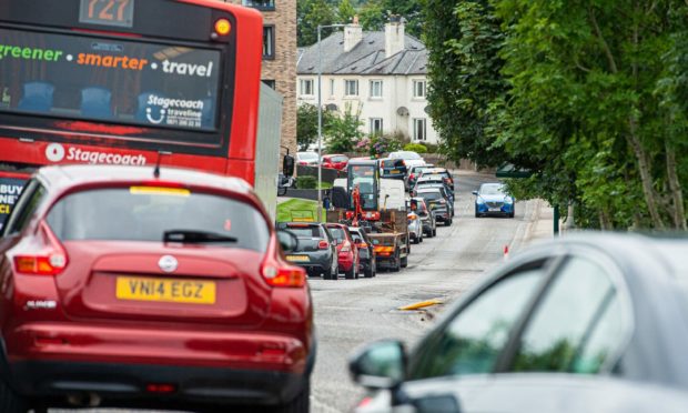 The works have caused delays of up to 30 minutes on Muggiemoss Road. Photo: Wullie Marr/DCT Media