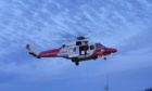 Two helicopters were dispatched to rescue crew members from an offshore installation after a fire was reported.