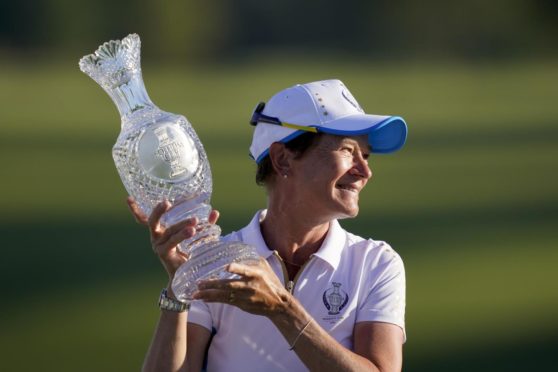 Catriona Matthew takes back the Solheim Cup after Europe's 15-13 win in Ohio.