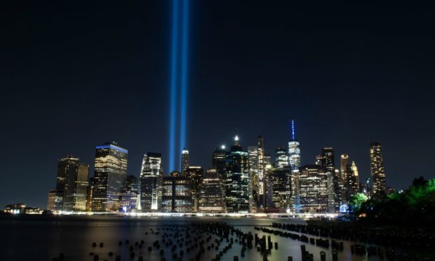 The Towers of Light Memorial illuminating the New York City skyline with The Freedom Tower on The 20th anniversary of The 9/11 attacks (Photo: Kostas Lymperopoulos/CSM/Shutterstock)