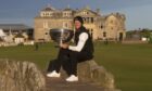Danny Willett on the Swilken Bridge with the Alfred Dunhill Links Championship trophy