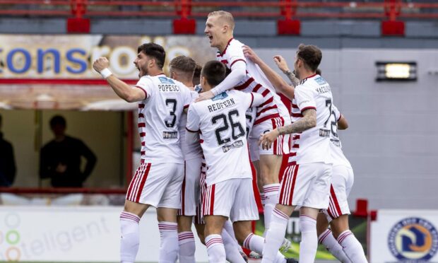 Hamilton players celebrate Lewis Smith's goal to make it 1-0 early on against Caley Thistle.