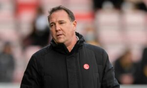 Malky Mackay has mixed emotions following Ross County’s defeat to Rangers at Ibrox