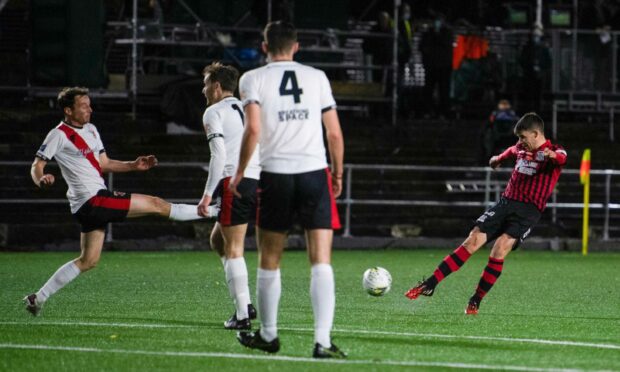 Rory MacEwan (right) makes it 1-0 for Elgin City against Clydebank.