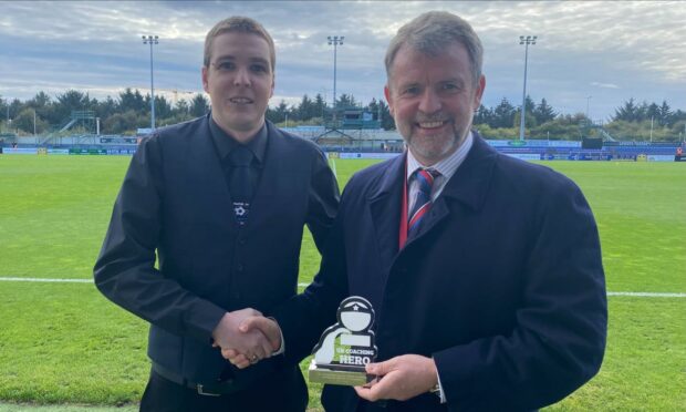 Alyn Gunn, left, receieves his UK Coaching award from Caley Thistle chairman Ross Morrison ahead of Saturday's match against Morton.