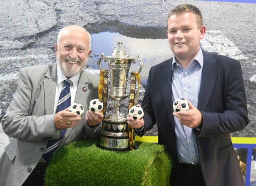 Highland League president George Manson, left, and Grant Shewan (MD of GPH Builders Merchants) at the Highland League Cup draw..