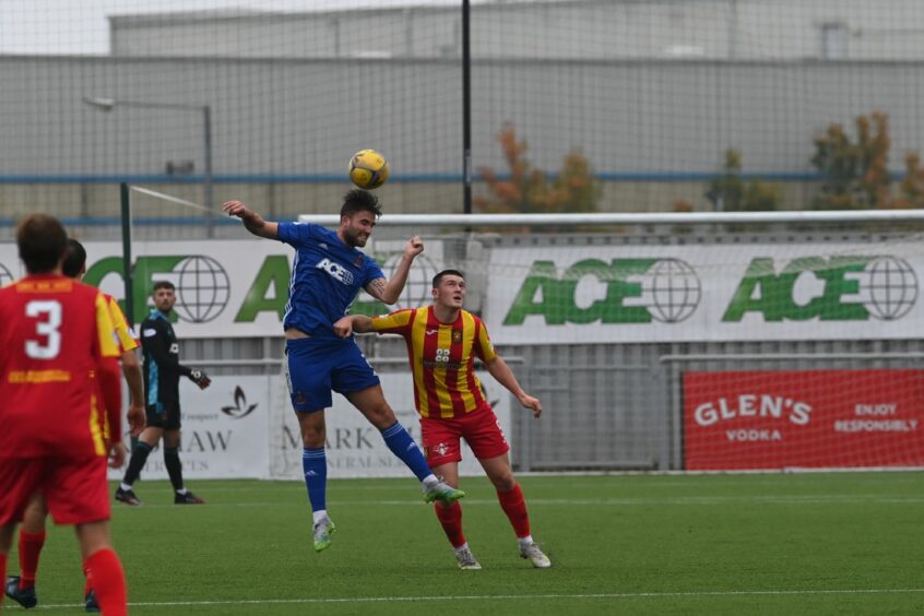 Morgyn Neill in action against Albion Rovers