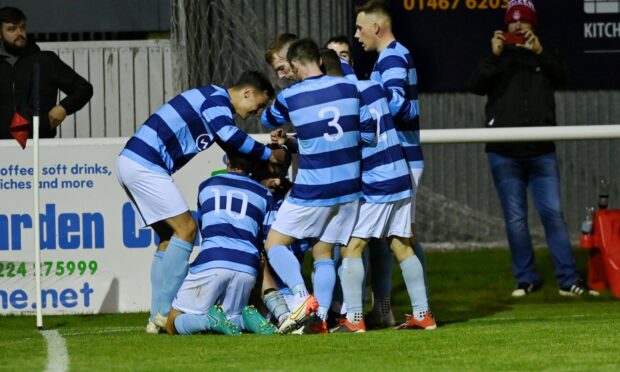 The Banks o' Dee players celebrate Mark Gilmour's opener in the Evening Express Aberdeenshire Cup final against Formartine