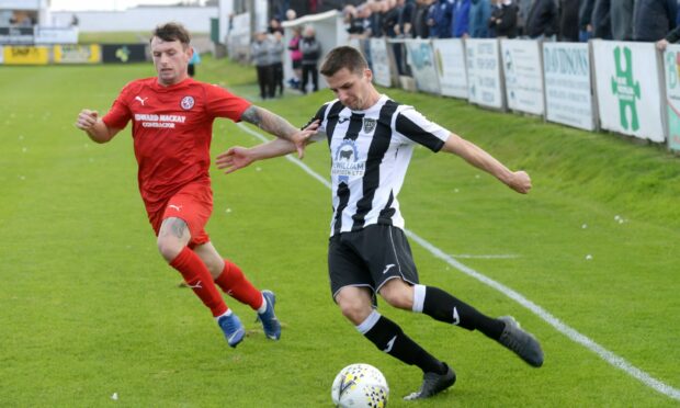 Brora's Alasdair Sutherland and Fraserburgh's Paul Young.