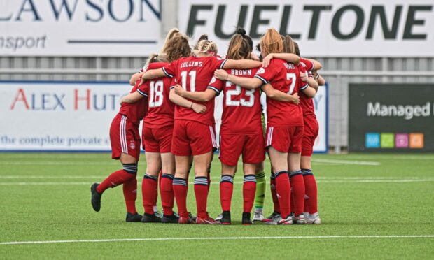 Aberdeen FC Women's team huddle.