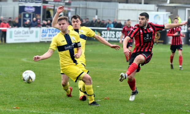 CR0015803 Highland League match between Inverurie Locos and Wick Academy at Harlaw Park, Inverurie. In the picture Calum Dingwall shoots. 
Picture by Jim Irvine  2-11-19