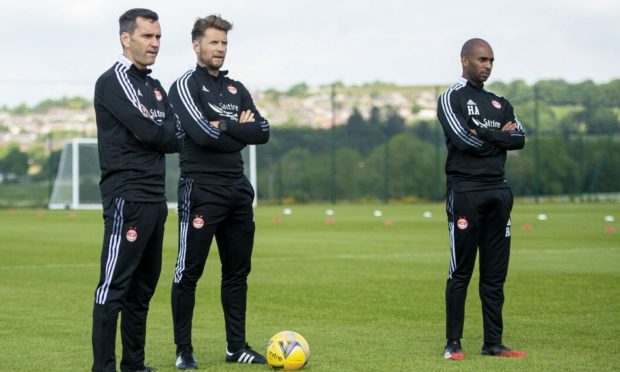 Manager Stephen Glass alongside coaches Allan Russell and Henry Apaloo.