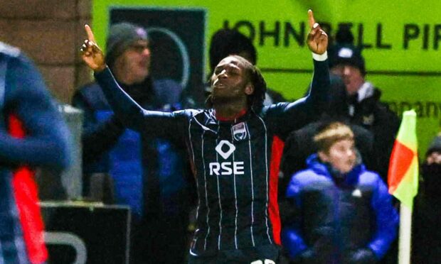 Joseph Hungbo celebrates a goal against Dundee United.