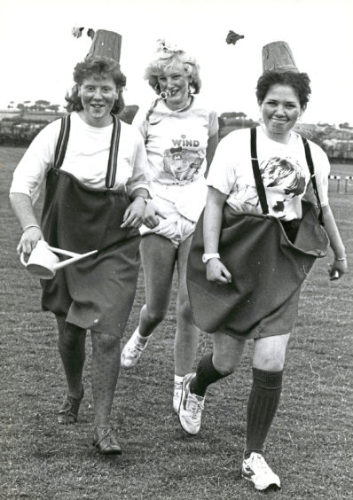 1987: Hazlehead Academy pupils Louise Mutch (left), Caireen Dalarno and Paula Angus lapped up a fancy dress fun run at the Aberdeen school. They were among 265 pupils who pounded the sports field in the sponsored event to raise money for charity. The trio, suitably dressed up for the occasion, ran 1km - two and a half laps of their sports fields.