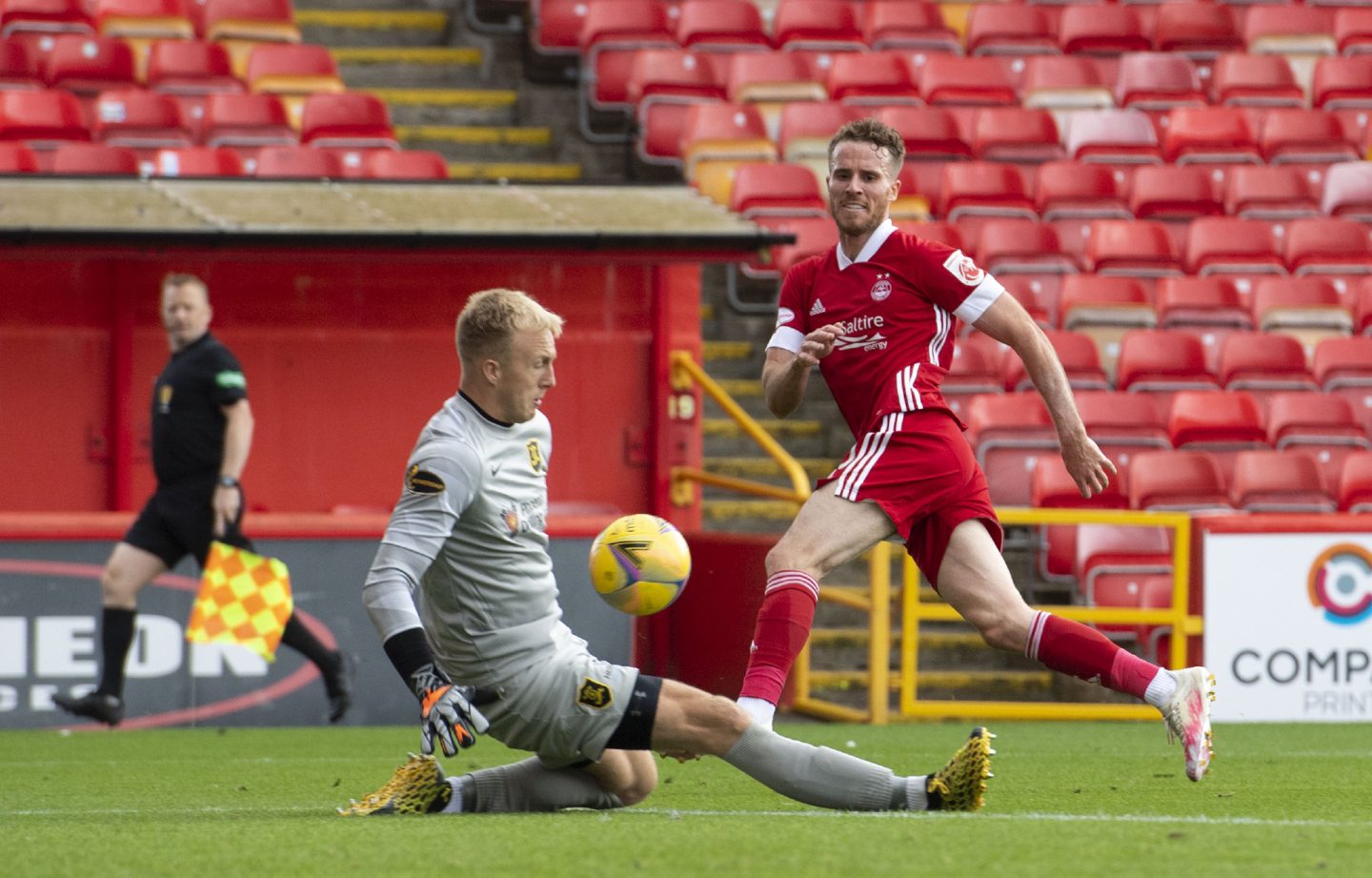 Marley Watkins is denied by Livingston goalkeeper Robby McCrorie while playing for Aberdeen.