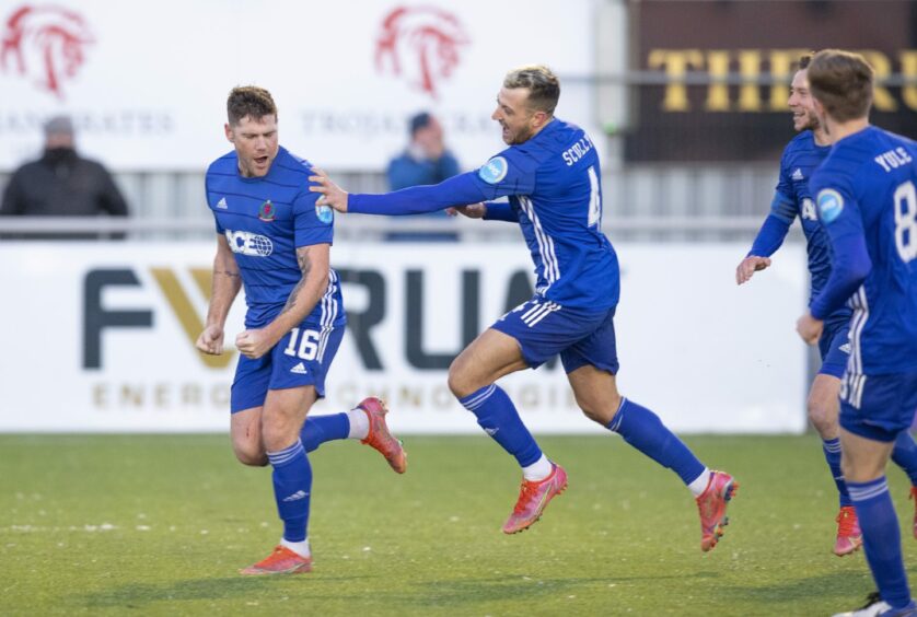 Iain Vigurs is congratulated by Connor Scully after equalising for Cove Rangers
