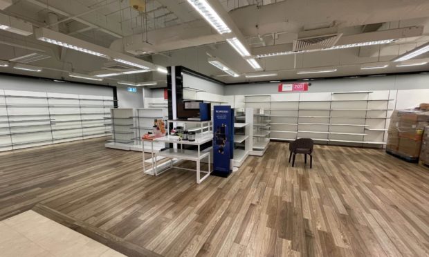 The empty shelves in the city centre store.