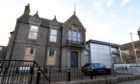 Windows were boarded up at Peterhead Sheriff Court following the incident.
