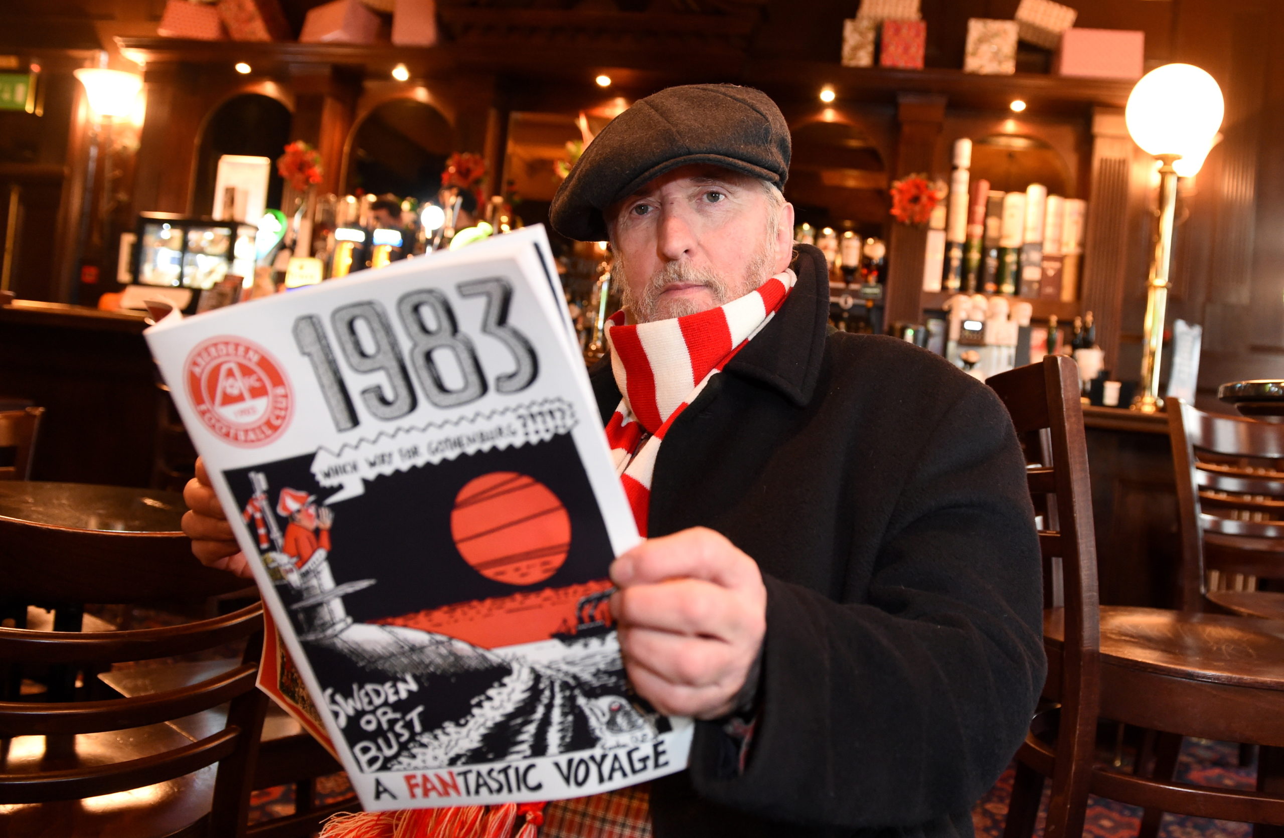 Red Final artist Gordon Reid with the edition which detailed Aberdeen’s winning season in Europe.