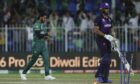 Pakistan's Hasan Ali, left, celebrates the dismissal of Scotland captain Kyle Coetzer