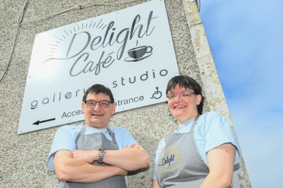 Andy Martin, owner of Delight Café Gallery, and his daughter Rosie