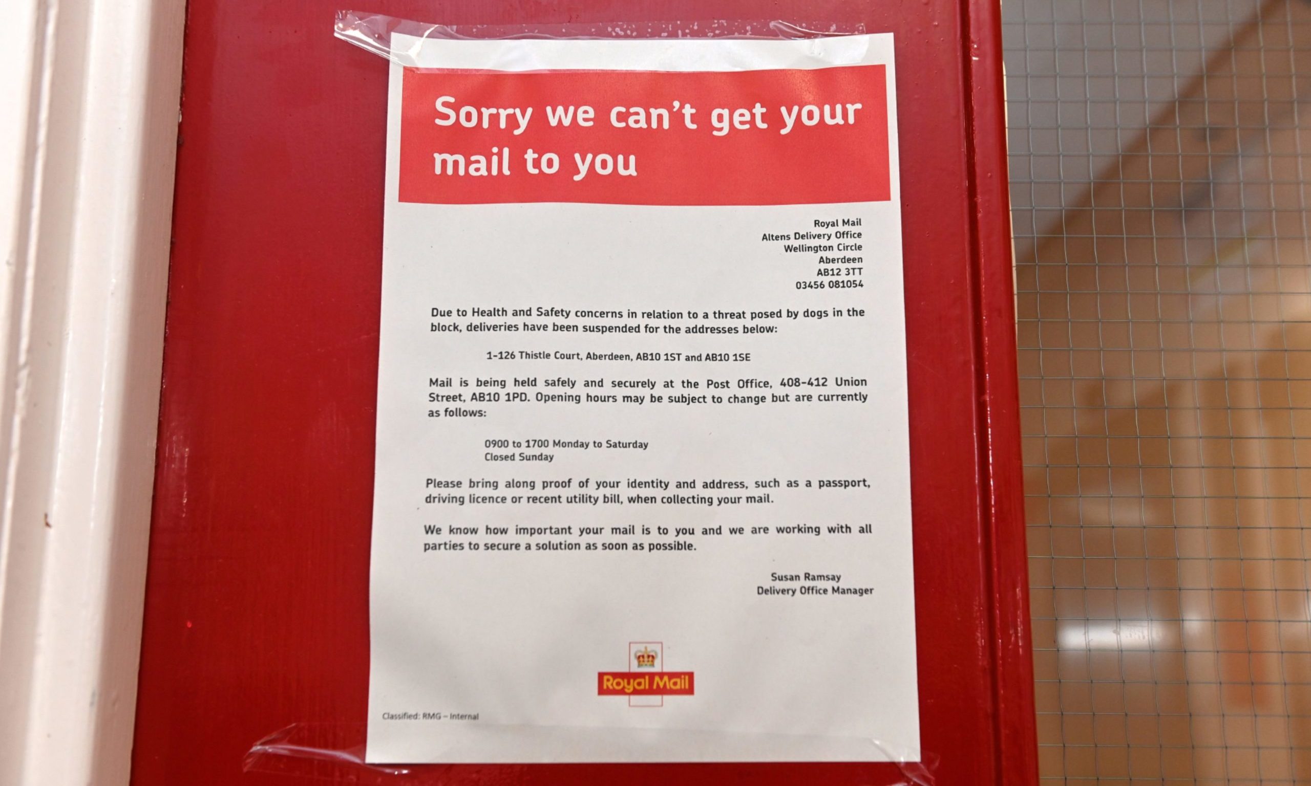 A notice explaining the decision to halt postal deliveries into Thistle Court, Aberdeen, written by Susan Ramsay, manager of the Royal Mail Altens delivery office.