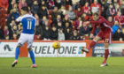 Aberdeen's Niall McGinn makes it 3-1 against Kilmarnock.