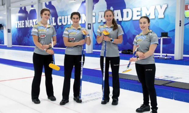 Skip Fay Henderson, second from right, and her Team Henderson teammates.