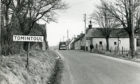 Pictured is the start of the Main Street at Tomintoul, 1976