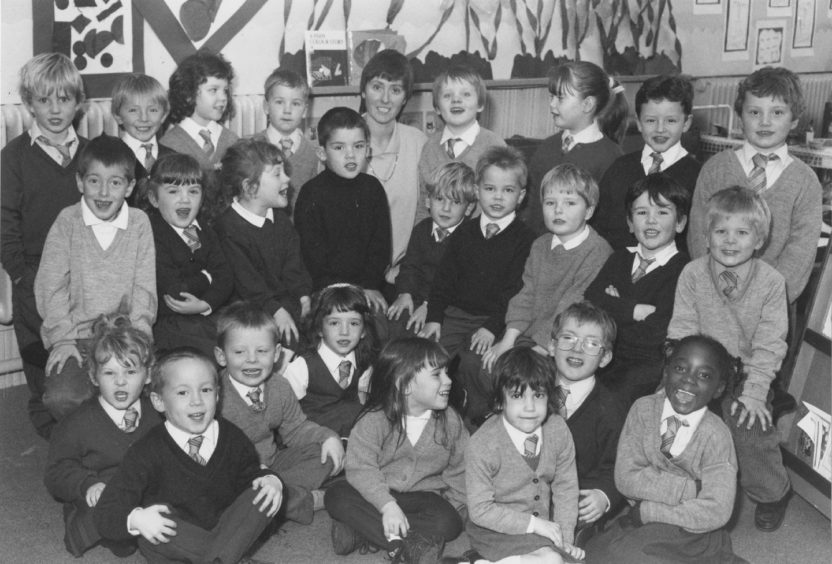 1992: Look this way: Mrs Liz Gilchrist with her primary one class at Victoria Road School in Torry.