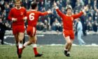 Martin Buchan congratulates Joe Harper during the 1970 Scottish Cup final win.