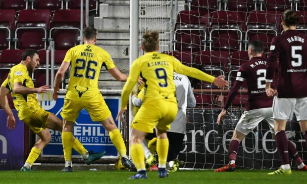 Ross County's Connor Randall misses a chance to equalise late on against Hearts.