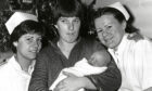 1981 - Mary Thompson, of Aberdeen, with baby Brian, born on Christmas Day at Summerfield Hospital, and staff  midwives Leanne Rennie, left, and Morag Innes