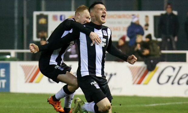 Darryl McHardy celebrating his equalising goal with Russell Dingwall.