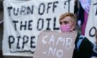 Climate activists protest against the Cambo oil field in Glasgow during COP26 (Photo: Andrew Milligan/PA Wire)