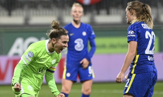 Wolfsburg's Svenja Huth celebrates scoring during the Women's Champions League soccer match between VfL Wolfsburg and Chelsea FC at AOK Stadion in Wolfsburg, Germany.