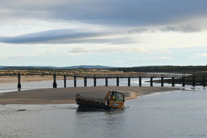 Construction underway on a working platform for contractors to build the new Lossiemouth bridge. Photos: Jason Hedges/DCT Media