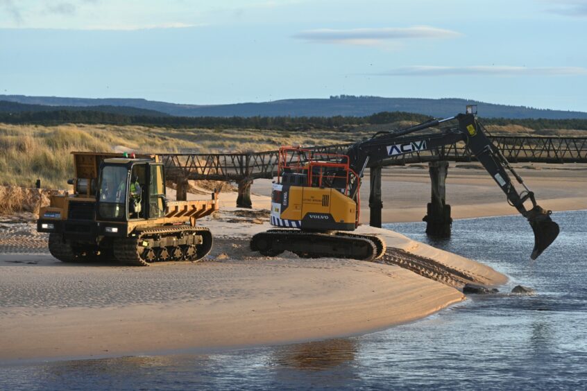 Construction underway on a working platform for contractors to build the new Lossiemouth bridge. Photos: Jason Hedges/DCT Media
